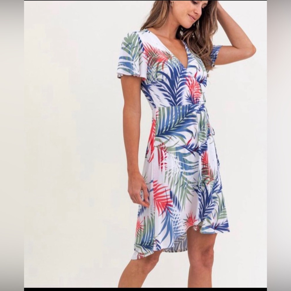 Beautiful Palm leaf stretch Faux wrap around dress. From Gilli. New